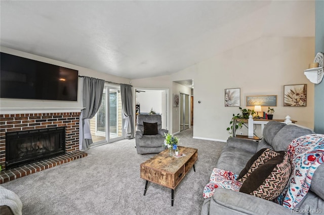 646 S Joplin St, Aurora, CO 80017 - living room featuring vaulted ceiling, carpet floors, and a brick fireplace
