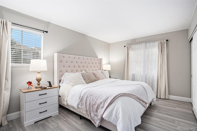 bedroom featuring light hardwood / wood-style floors