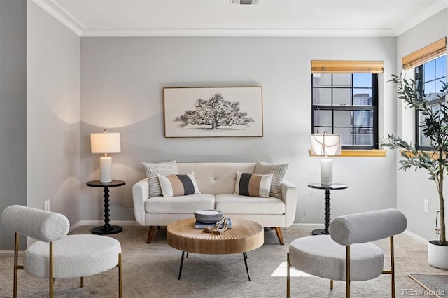 living area with carpet flooring, visible vents, crown molding, and baseboards