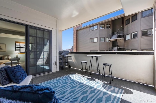 balcony featuring area for grilling