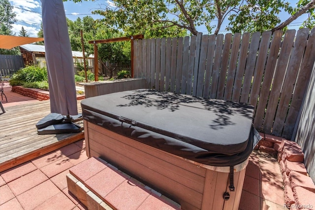 225 Shavano St, Poncha Springs, CO 81242 - wooden terrace featuring a hot tub and a fenced backyard
