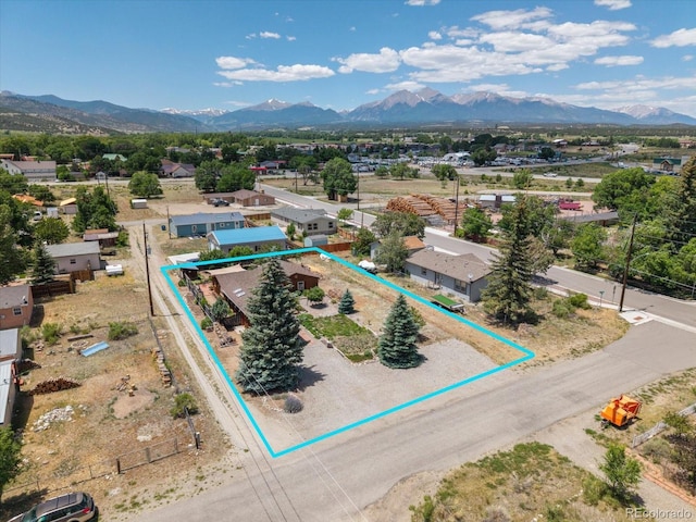 225 Shavano St, Poncha Springs, CO 81242 - aerial overview of property's location featuring a mountain backdrop and property parcel outlined