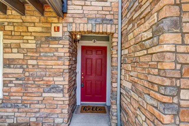2763 W Riverwalk Cir Unit B, Littleton, CO 80123 - property entrance featuring brick siding