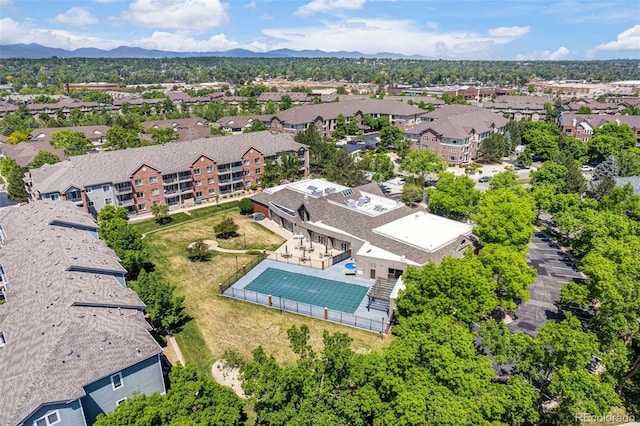 2763 W Riverwalk Cir Unit B, Littleton, CO 80123 - aerial perspective of suburban area with a mountain backdrop