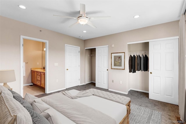 2763 W Riverwalk Cir Unit B, Littleton, CO 80123 - carpeted bedroom featuring multiple closets, baseboards, recessed lighting, ensuite bath, and a ceiling fan