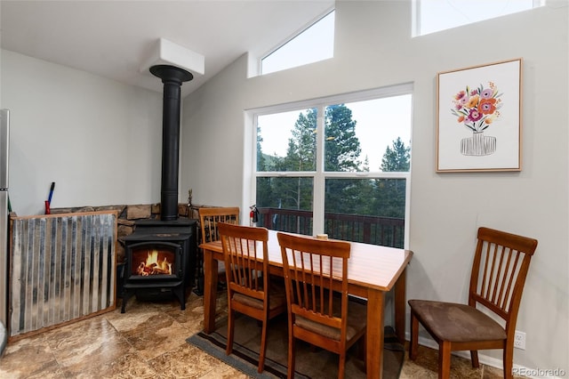 302 Texas Dr, Idaho Springs, CO 80452 - dining room with a wood stove and high vaulted ceiling