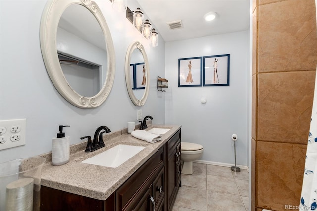 302 Texas Dr, Idaho Springs, CO 80452 - full bath featuring double vanity and tile patterned floors