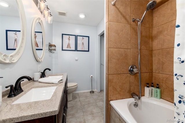 302 Texas Dr, Idaho Springs, CO 80452 - bathroom with tiled shower / bath, tile patterned floors, and double vanity