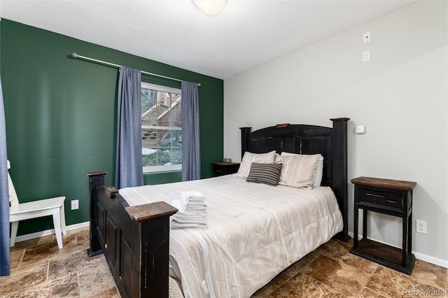 302 Texas Dr, Idaho Springs, CO 80452 - bedroom with stone tile flooring and baseboards