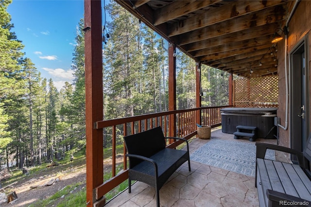 302 Texas Dr, Idaho Springs, CO 80452 - view of patio / terrace with a hot tub