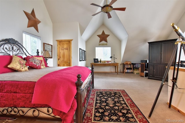 bedroom with high vaulted ceiling, light colored carpet, and multiple windows