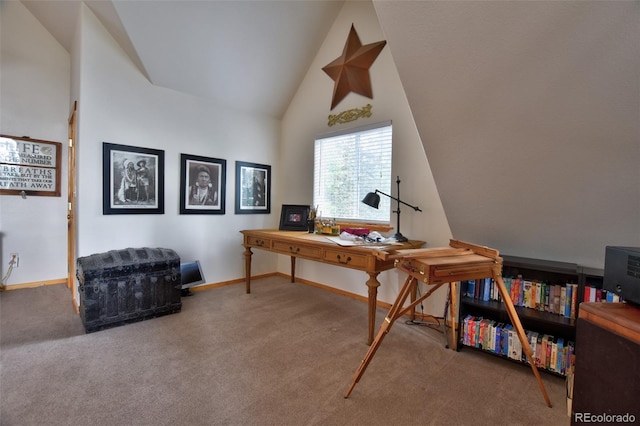 home office with vaulted ceiling, carpet flooring, and baseboards