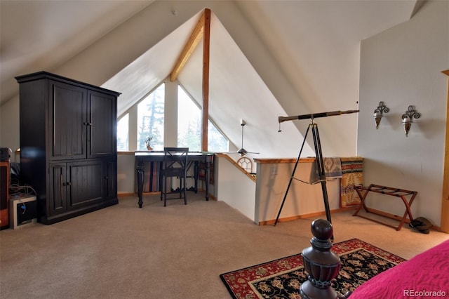 interior space with vaulted ceiling with beams and baseboards