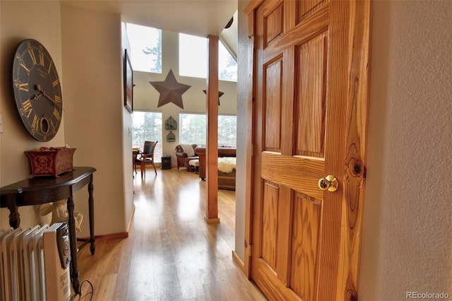 hallway featuring light wood-type flooring