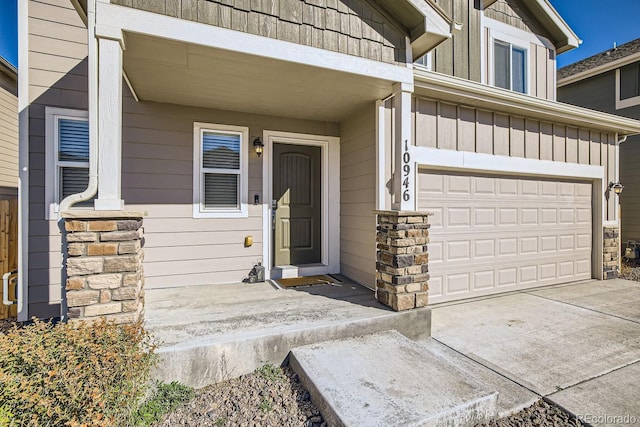 doorway to property featuring a garage