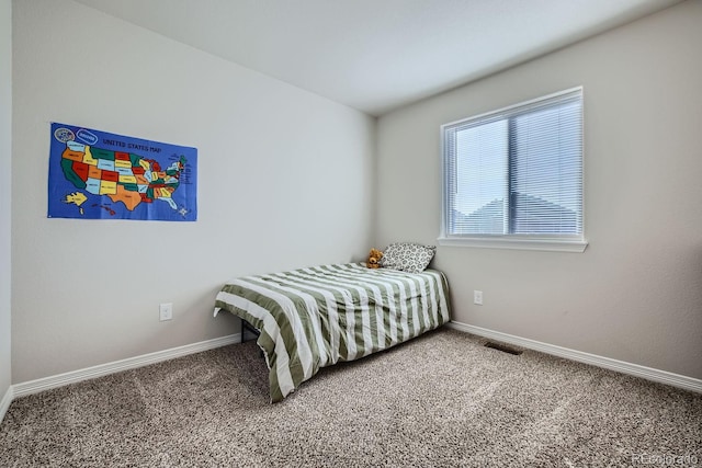 bedroom featuring carpet floors