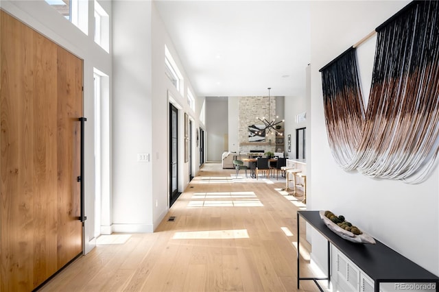 5070 Easley Rd, Golden, CO 80403 - hall with a high ceiling and light wood-type flooring