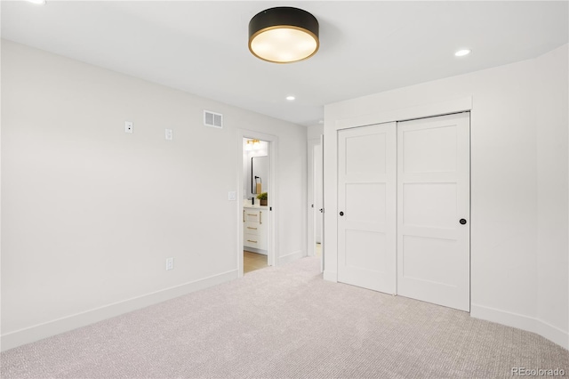 5070 Easley Rd, Golden, CO 80403 - unfurnished bedroom featuring light carpet, a closet, and recessed lighting