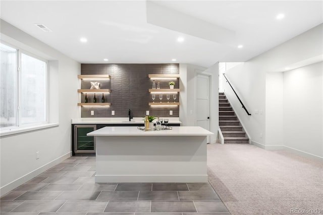 5070 Easley Rd, Golden, CO 80403 - indoor wet bar with recessed lighting, wine cooler, stairs, and light tile patterned flooring