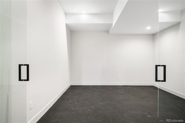 5070 Easley Rd, Golden, CO 80403 - empty room with finished concrete floors and recessed lighting
