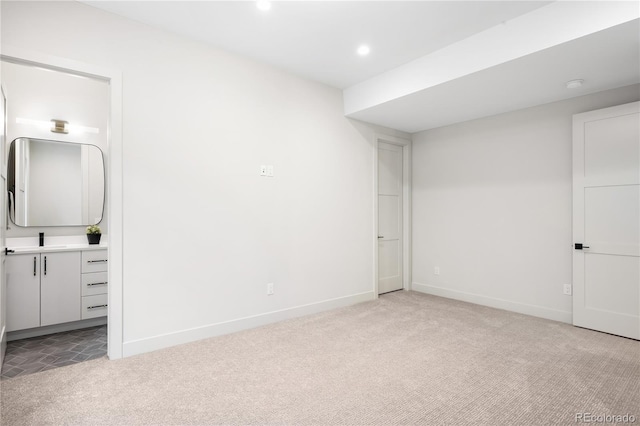 5070 Easley Rd, Golden, CO 80403 - unfurnished bedroom featuring light carpet, recessed lighting, and connected bathroom
