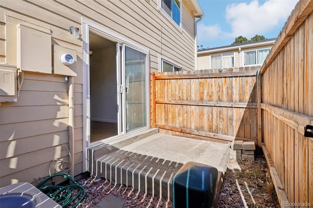 view of patio with fence