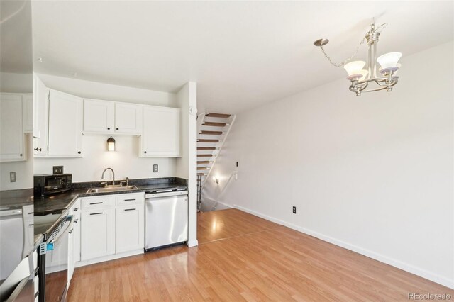 8975 Field St Unit 39, Broomfield, CO 80021 - kitchen featuring dishwasher, a sink, light wood finished floors, a chandelier, and dark countertops