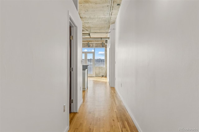 2020 Arapahoe St Unit 970, Denver, CO 80205 - hall with light wood-type flooring and baseboards