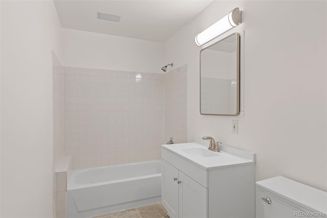 2020 Arapahoe St Unit 970, Denver, CO 80205 - bathroom featuring toilet, vanity, and shower / bathtub combination