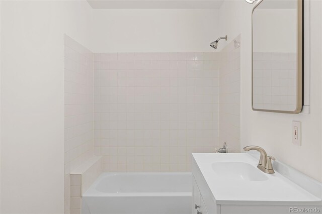 2020 Arapahoe St Unit 970, Denver, CO 80205 - bathroom with vanity and tub / shower combination