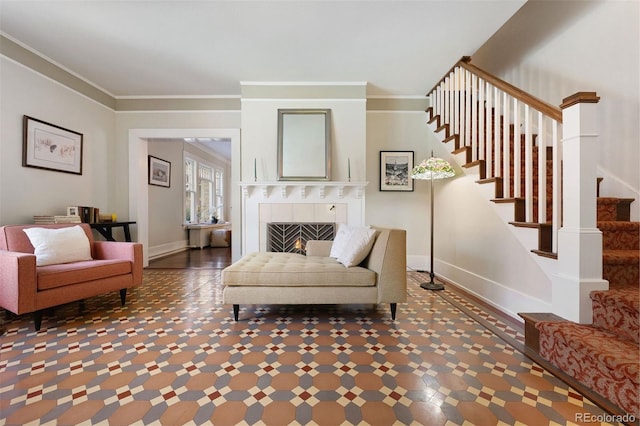 36 Lake Ave, Colorado Springs, CO 80906 - living room with stairway, baseboards, and ornamental molding