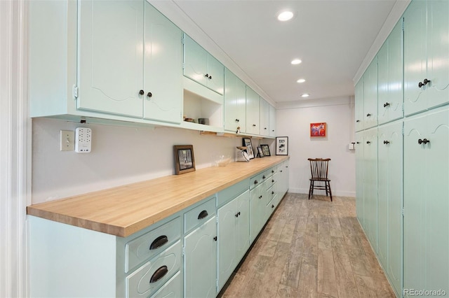 36 Lake Ave, Colorado Springs, CO 80906 - kitchen featuring light countertops, recessed lighting, light wood-type flooring, open shelves, and baseboards
