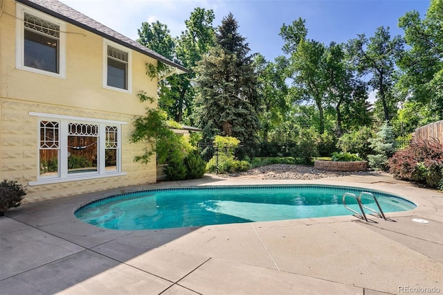 36 Lake Ave, Colorado Springs, CO 80906 - view of swimming pool featuring a patio area