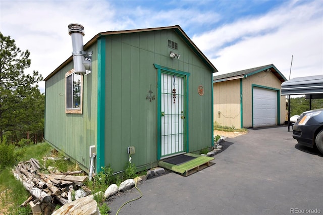 view of outbuilding with a garage