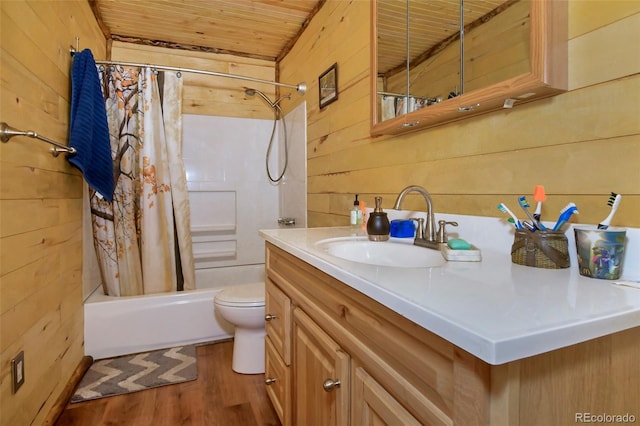 full bathroom featuring hardwood / wood-style flooring, wood walls, wood ceiling, and vanity