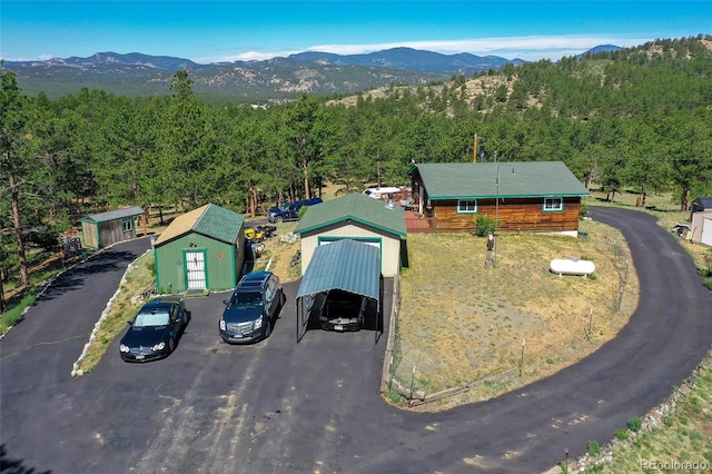 drone / aerial view featuring a mountain view