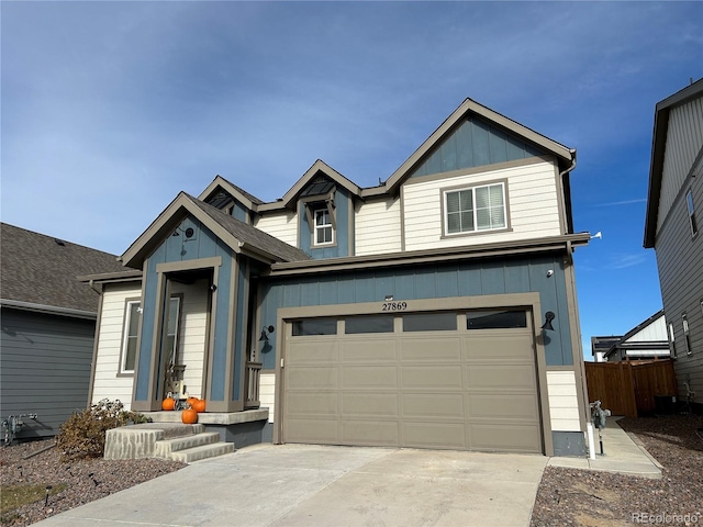 craftsman inspired home with a garage