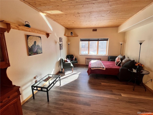 bedroom featuring wood ceiling and dark wood-type flooring