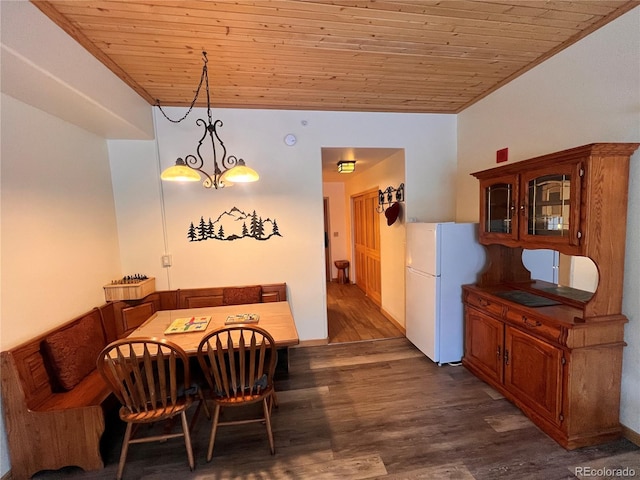 dining room featuring wooden ceiling, lofted ceiling, ornamental molding, a notable chandelier, and dark wood-type flooring