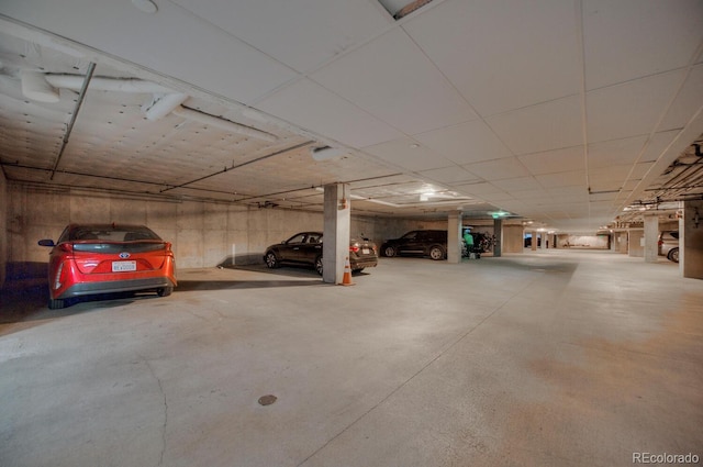 garage featuring a carport