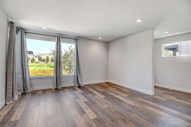 empty room featuring wood-type flooring