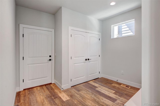 foyer featuring light wood-type flooring