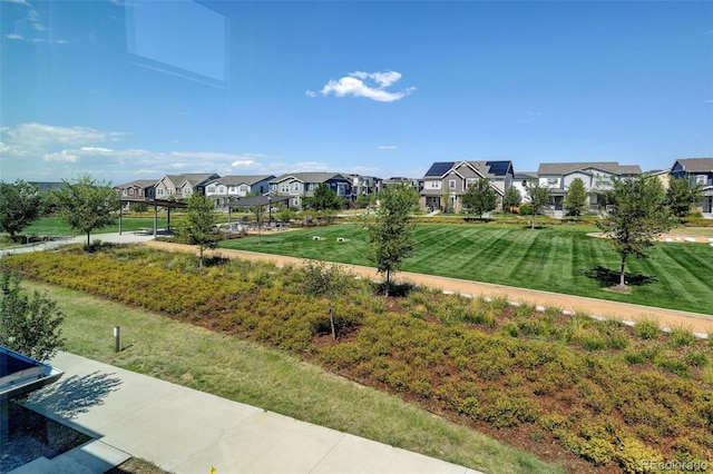 view of community featuring a lawn