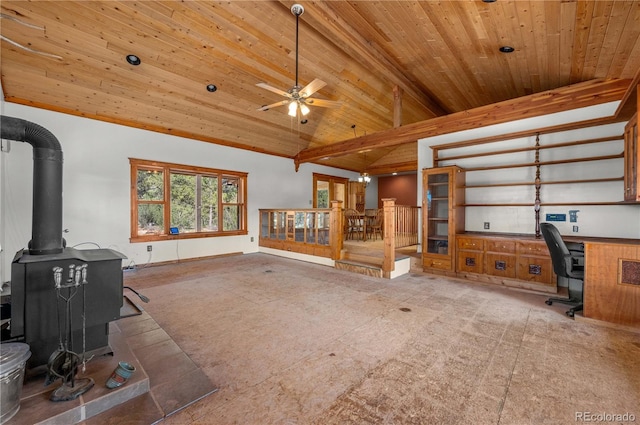 701/700 Bella Vista Ln, Cotopaxi, CO 81223 - unfurnished office featuring wooden ceiling with exposed beams, ceiling fan, a wood stove, and high vaulted ceiling