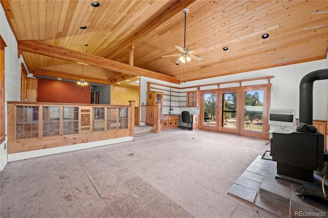 701/700 Bella Vista Ln, Cotopaxi, CO 81223 - living area with a wood stove, wooden ceiling, and a ceiling fan
