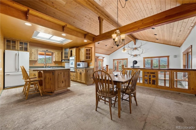 701/700 Bella Vista Ln, Cotopaxi, CO 81223 - dining area with wooden ceiling and a chandelier