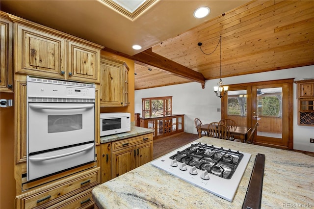701/700 Bella Vista Ln, Cotopaxi, CO 81223 - kitchen featuring white appliances, a warming drawer, pendant lighting, wood ceiling with exposed beams, and carpet flooring