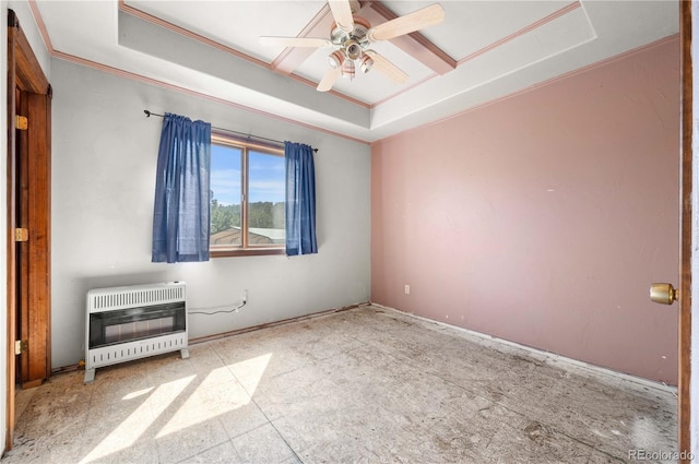 701/700 Bella Vista Ln, Cotopaxi, CO 81223 - empty room featuring heating unit, crown molding, a ceiling fan, a raised ceiling, and coffered ceiling