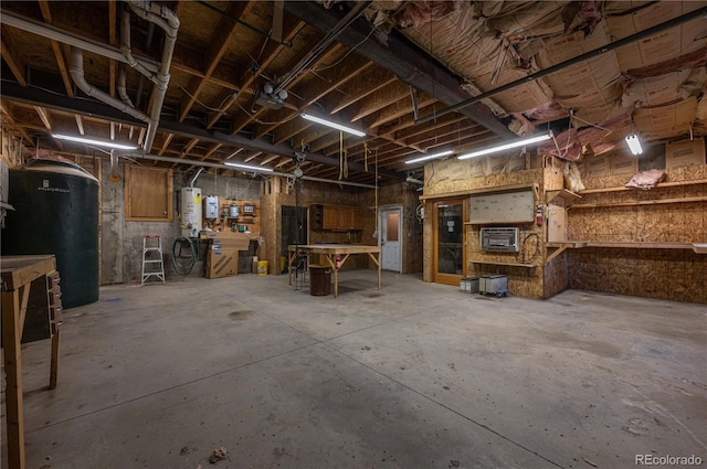 701/700 Bella Vista Ln, Cotopaxi, CO 81223 - basement featuring a workshop area and gas water heater