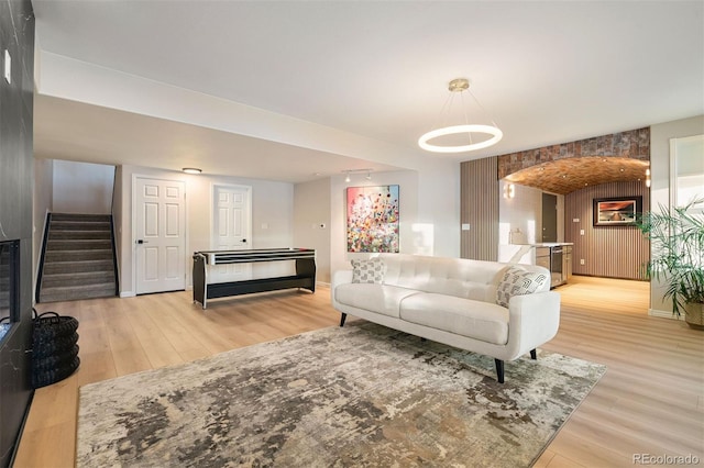 living room with light hardwood / wood-style floors